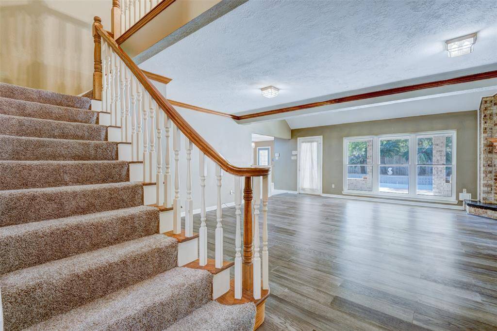 Stairs lead to the game room.