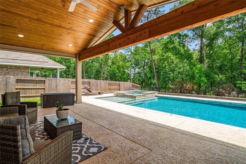 pool also has a hot tub
