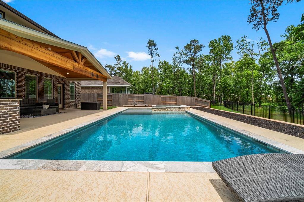 pool has a light system that puts on a show with different colors at night, Perfect for Gatherings!