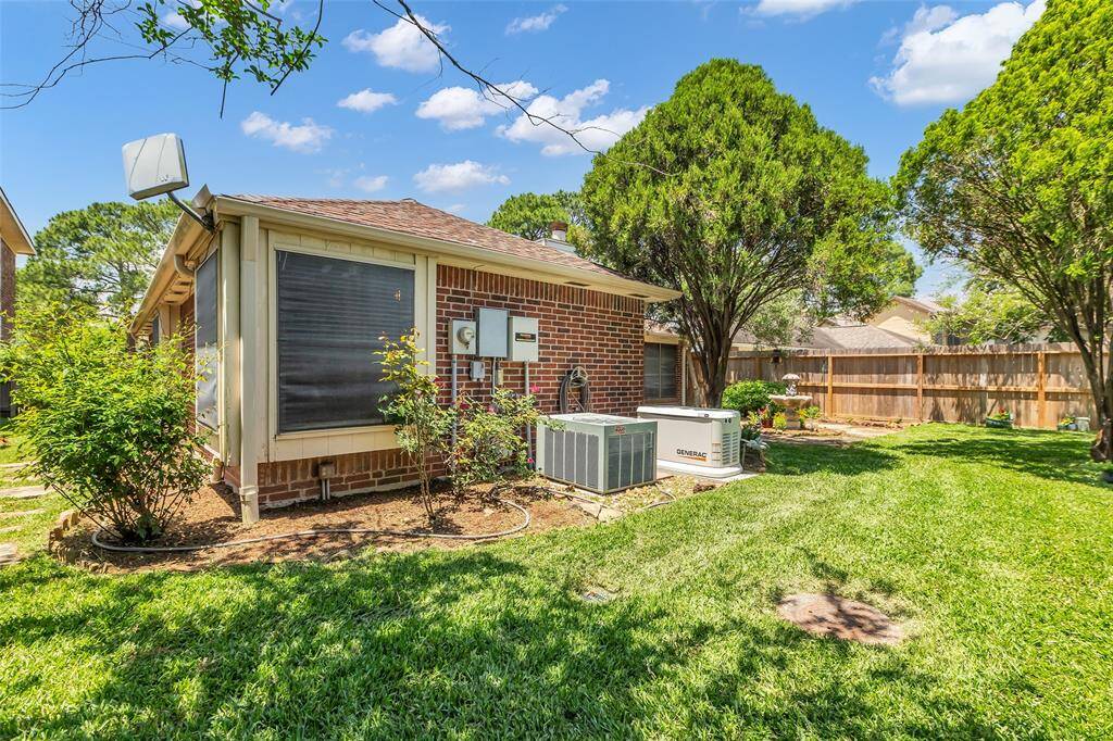 The backyard has french drains and space to enjoy being outdoors.