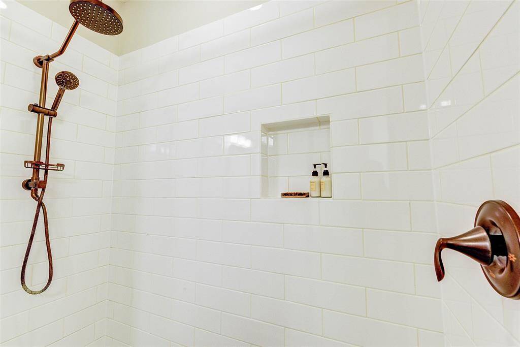 Rainfall shower head and handheld sprayer