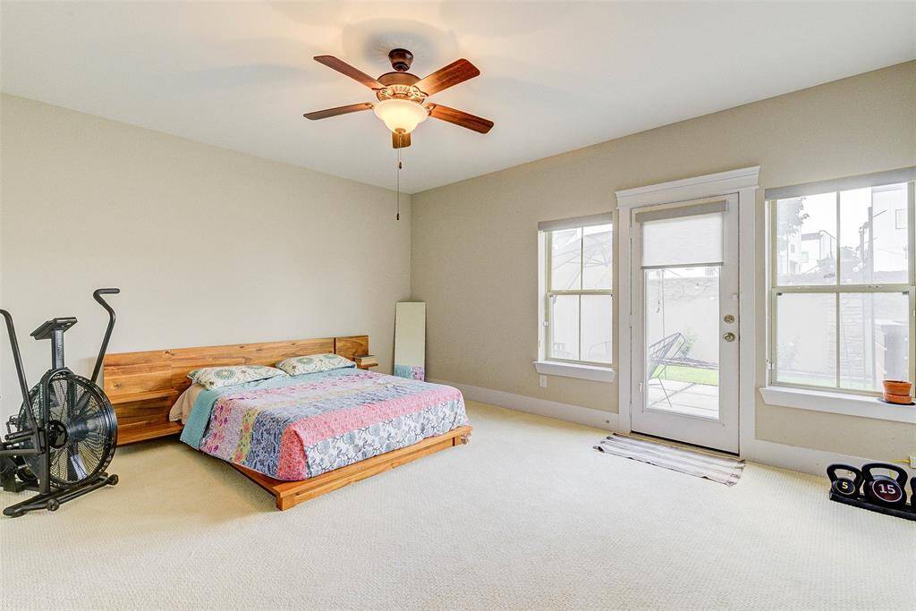 Large guest bedroom with en suite and easy access to backyard