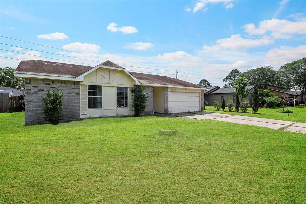 A charming one-story home on a generous lot.