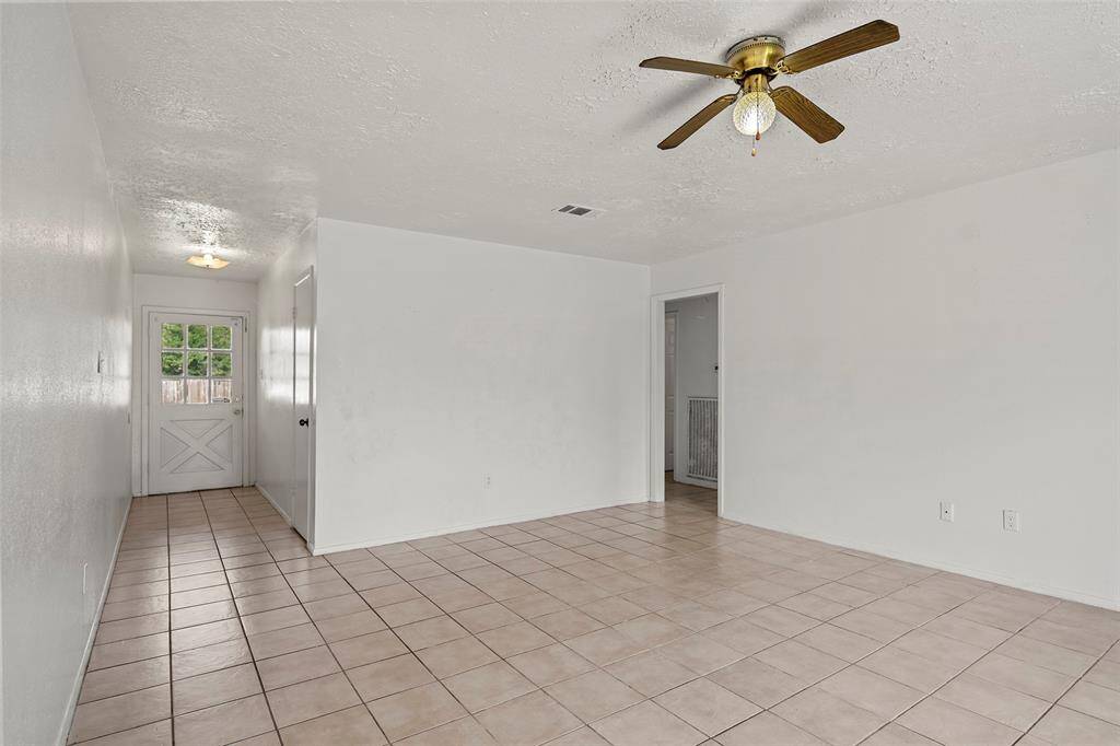 The French door the opens to the home allows in so much extra natural lighting!