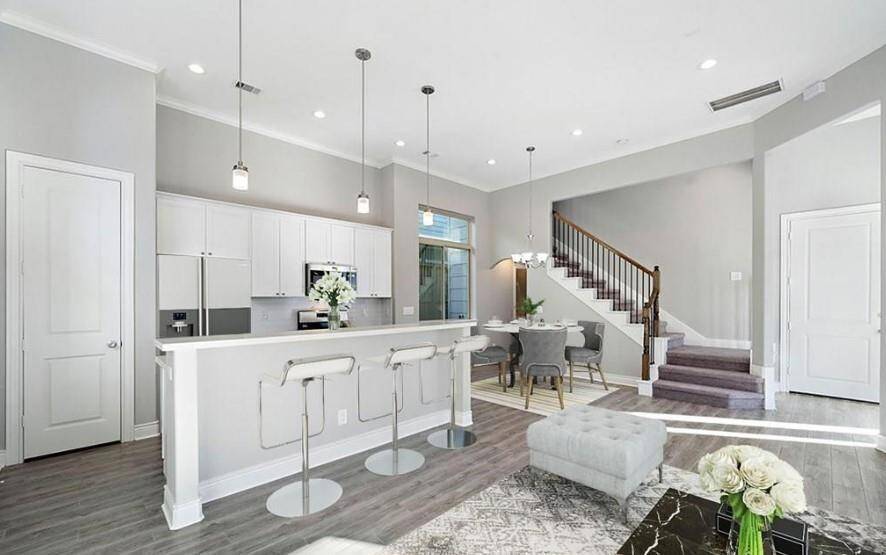 *Virtually Staged* Expansive open concept kitchen and dining room, perfect for those who love to cook and entertain!