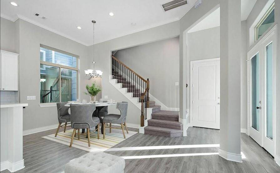 *Virtually Staged* Perfect open concept dining room with large windows of natural lighting