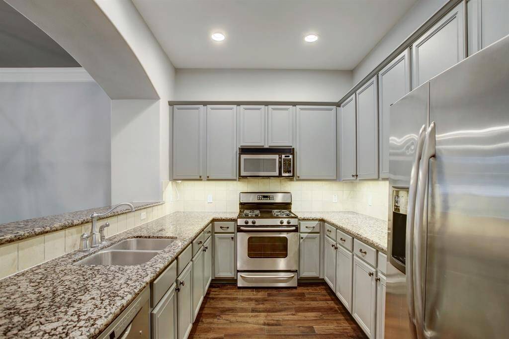 Lots of cabinet and drawer storage space.
