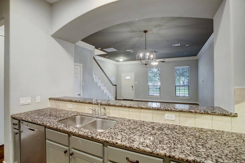 The homes Kitchen open's to the dining room and living room.