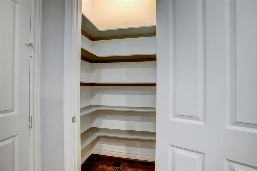 View of the homes walk in pantry.