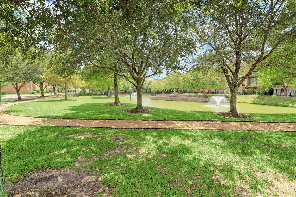 View of the community's private lake with jogging trail.
