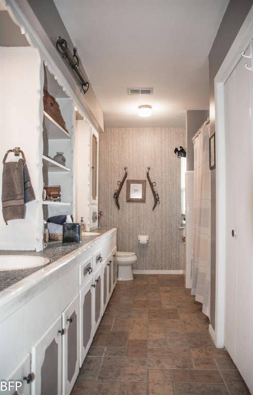 All tile, double sinks.