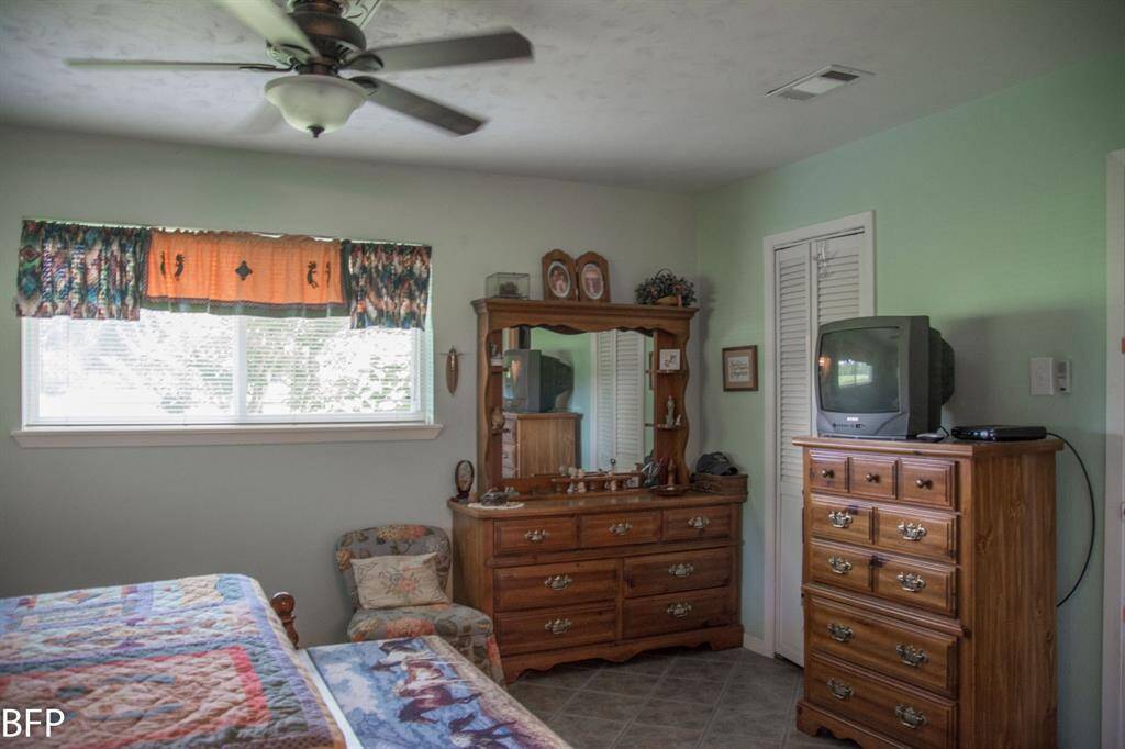 Master Bedroom with Hers and His closets.