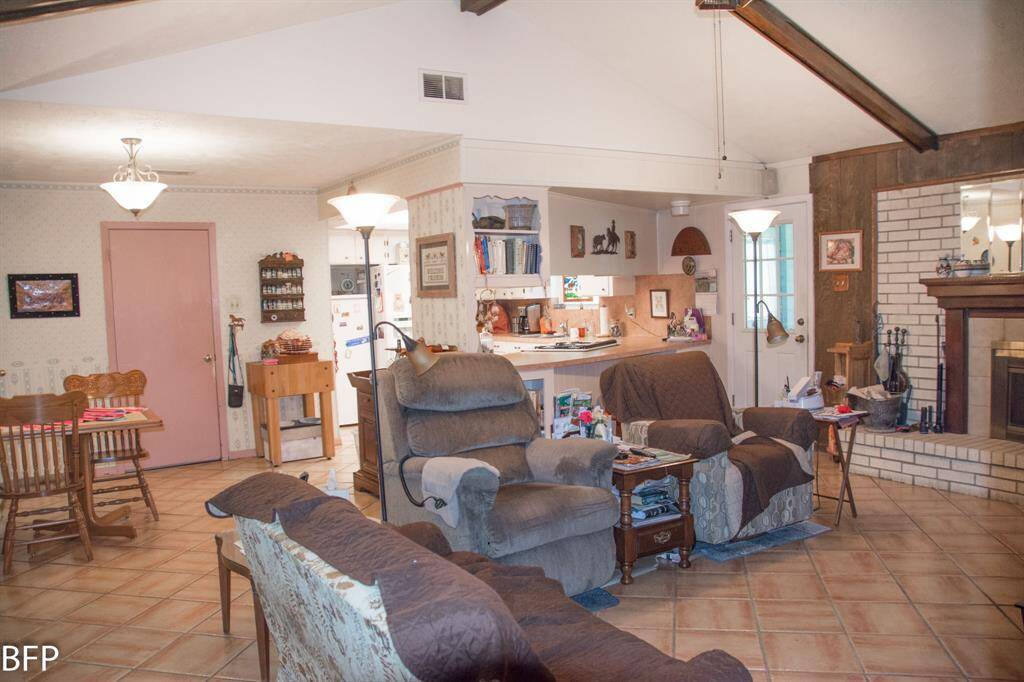 Vaulted, wood beam ceilings.
