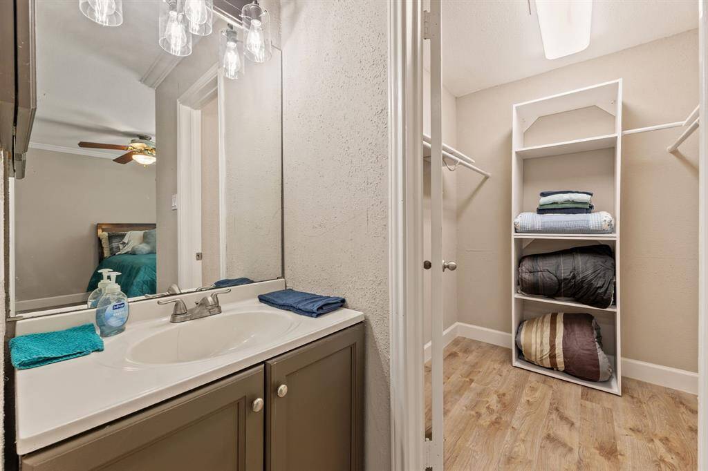Small vanity in second bedroom and walk-in closet
