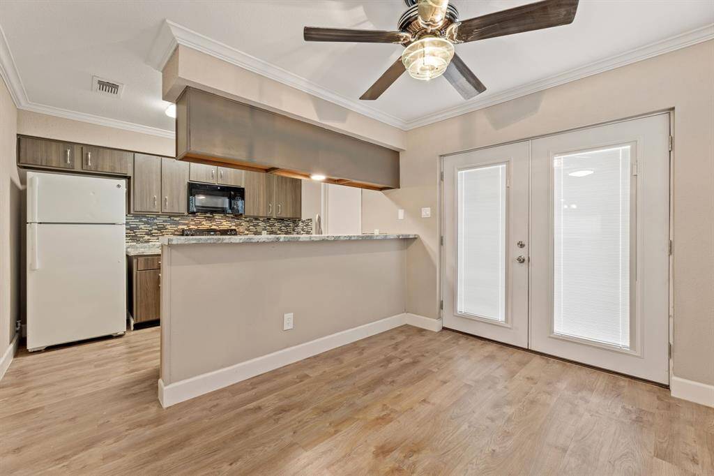 Kitchen overlooks breakfast/dining area