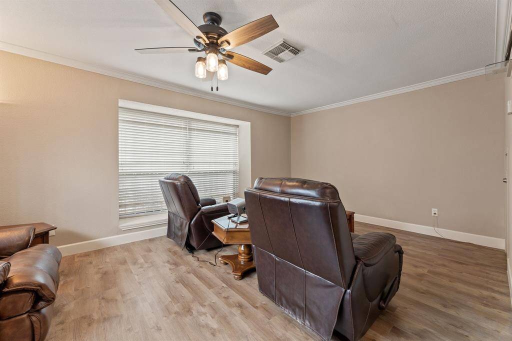 Living room wall has space for a huge TV