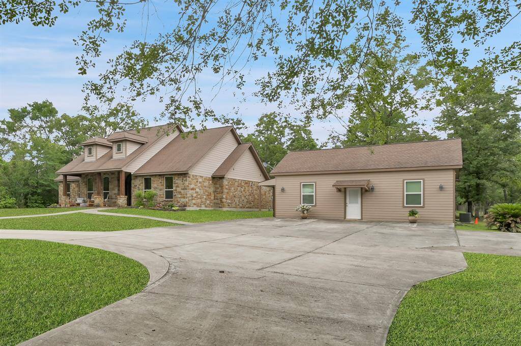 Front view of the Main Home, Guest Home and Parking Area.
