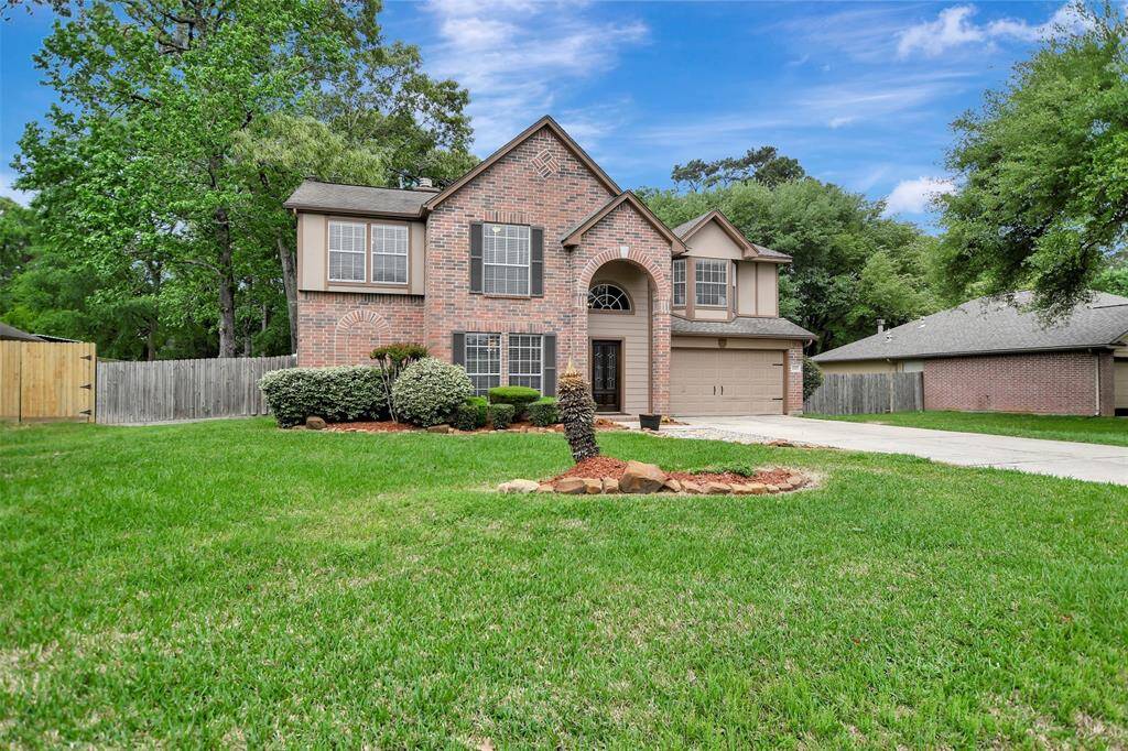This beautiful two-story brick home has 4 bedrooms + a game room.