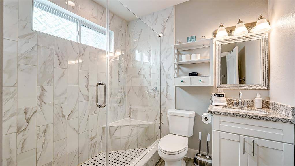 This primary bathroom is lux and luxurious!