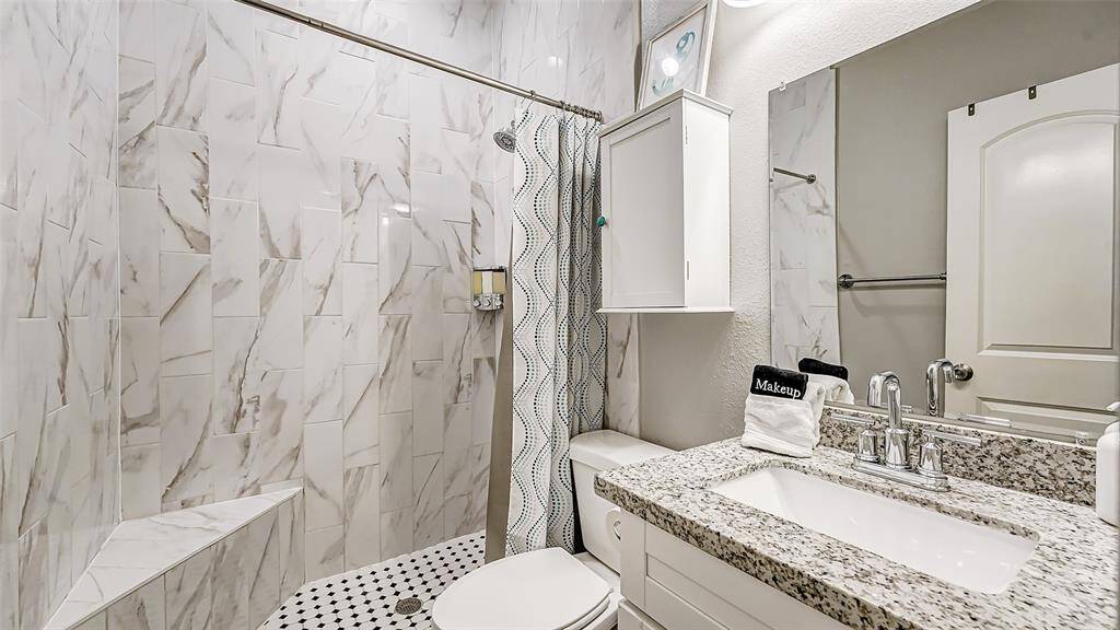 This hall bathroom is remodeled to perfection!