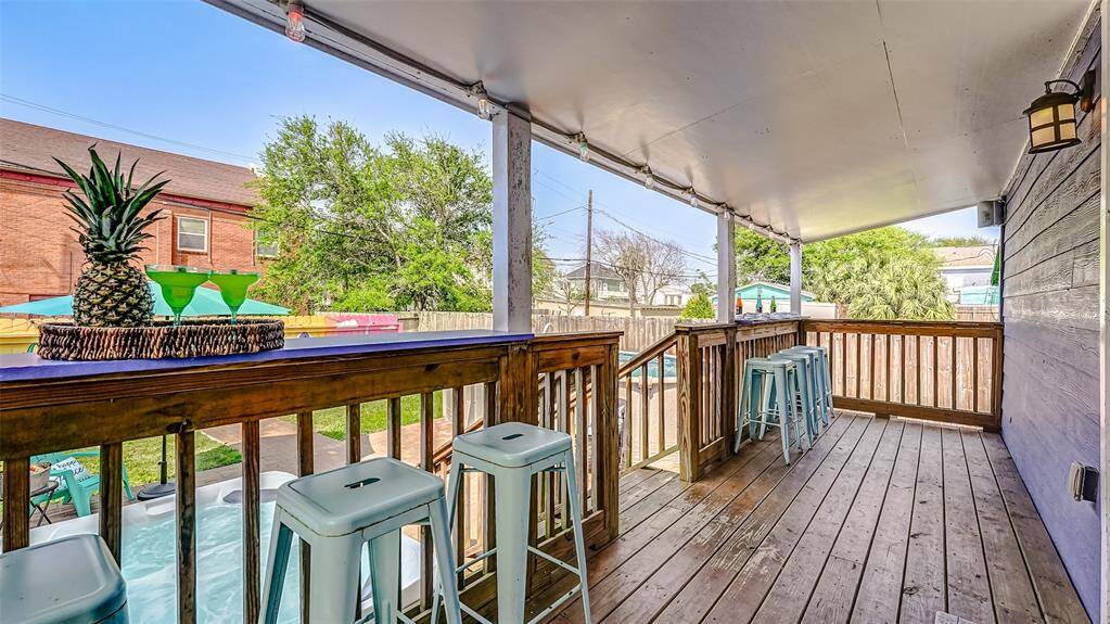 Lots of back porch seating at the back yard bar top!