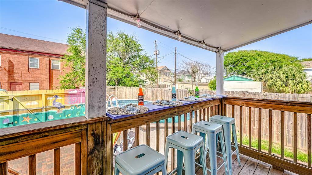 Escape the heat and watch the backyard fun on the bartop!