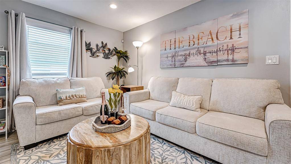 Soft sand and pale ocean hues make guests take a deep breath and relax in this space.