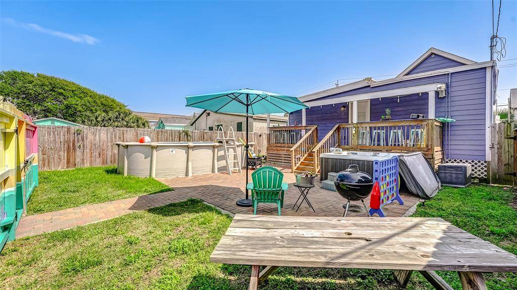 This spacious yard has room for the kids to run and play!