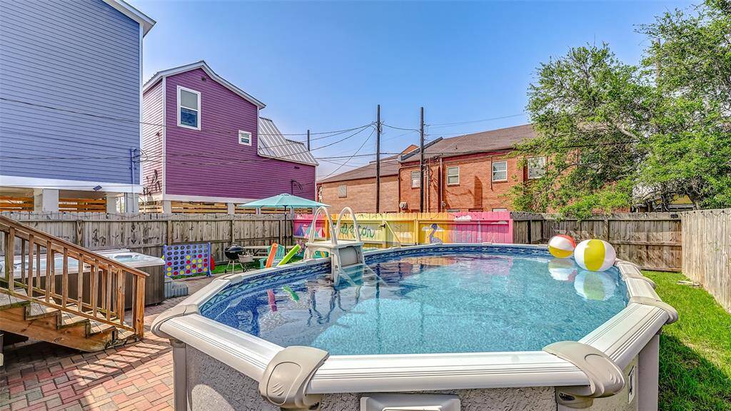 HEATED pool and hot tub too! Entertaining a crowd is easy!