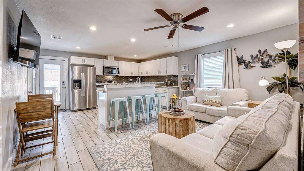 Such a beautiful home all set up for your beach vacay or rental property!