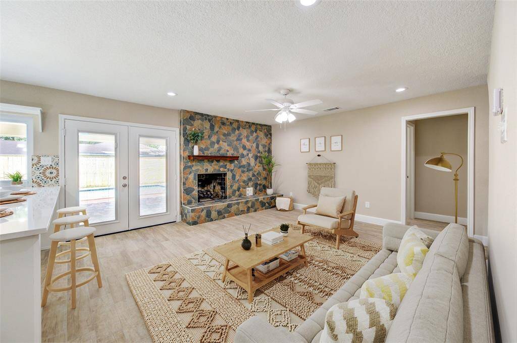 Another view of the open living space. *Virtually staged.
