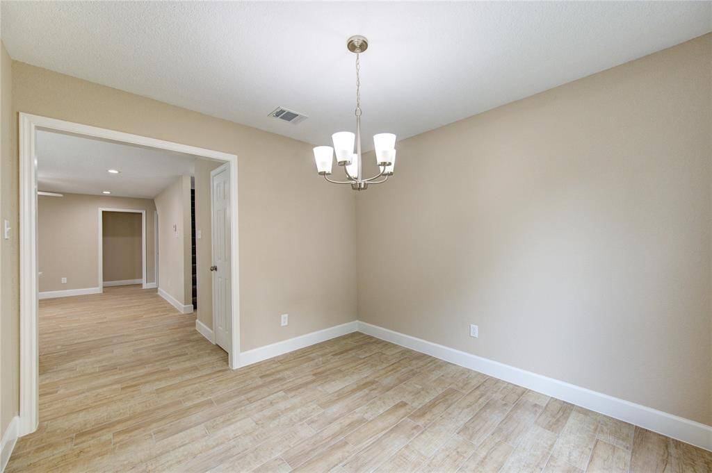 Another view of the bright and open dining area.