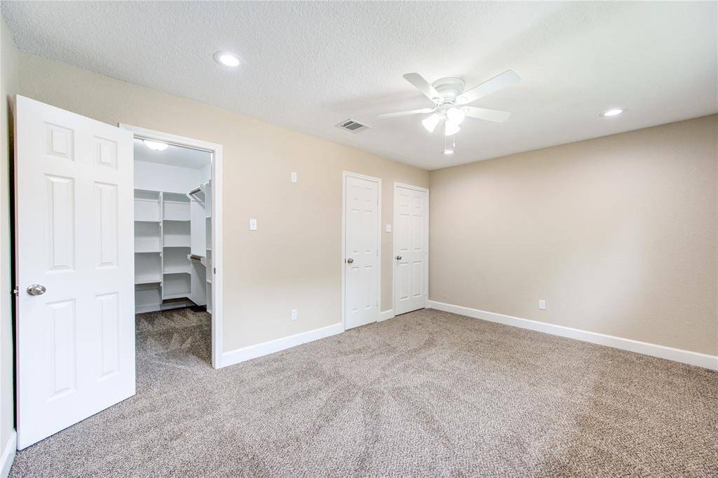 Another view of spacious primary suite.