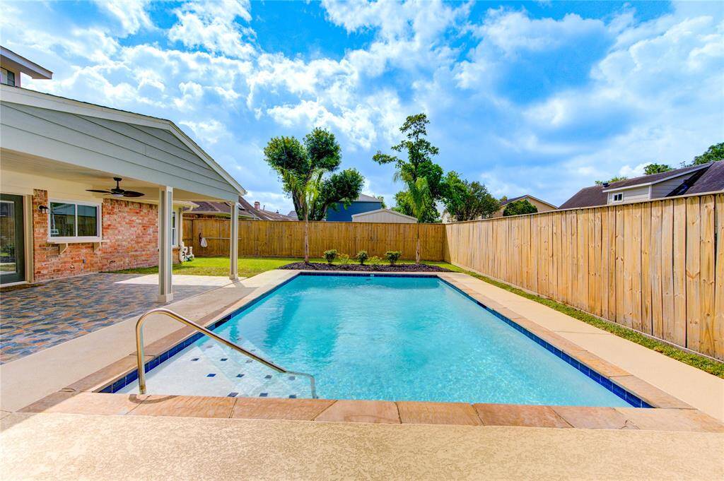 Check out the spacious in-ground pool with a sleek design.  It's calling your name!