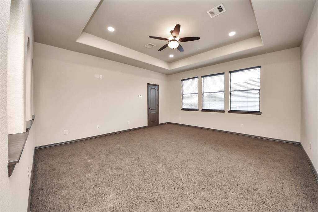 Endless possibilities in this upstairs flex space – media, gym, or playroom.