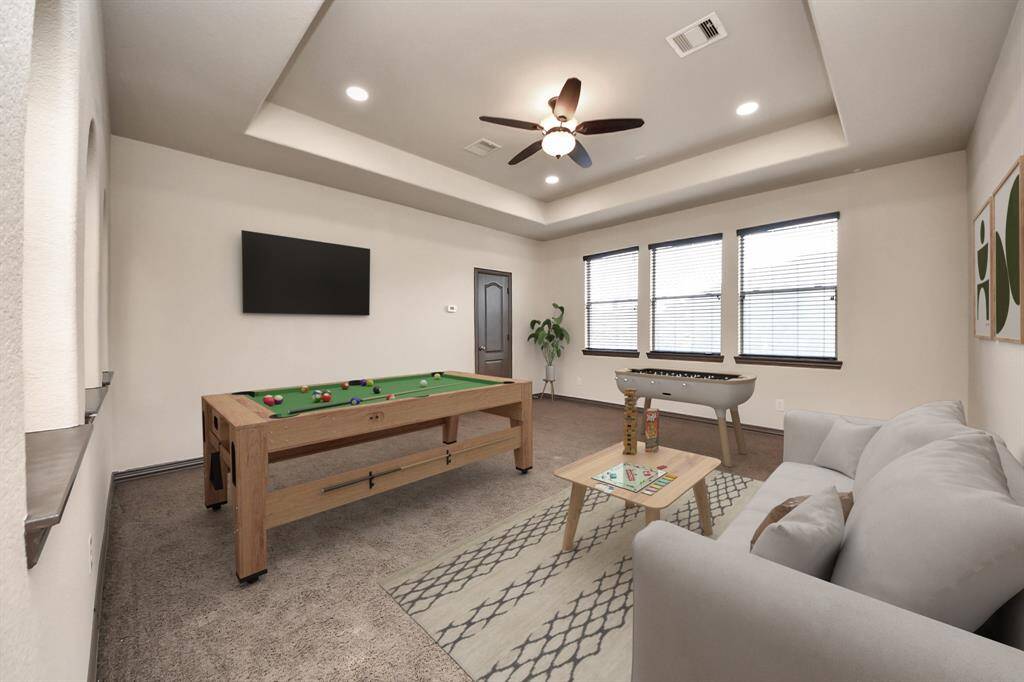Half-bath right off the upstairs game room area, perfect for guests.