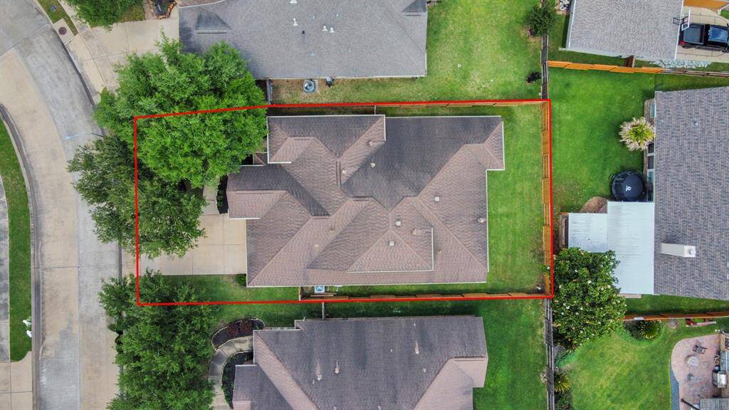 This bird’s-eye view highlights the full lot and spacious layout of your next dream home—tucked away on a quiet cul-de-sac.