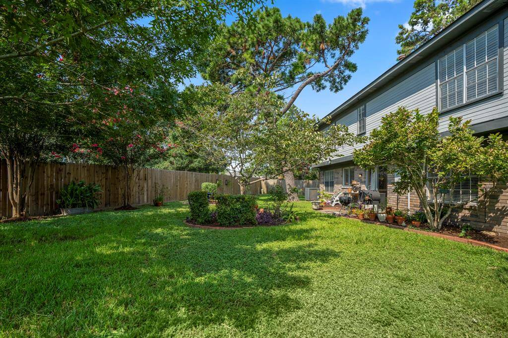 Another angle of the spacious backyard
