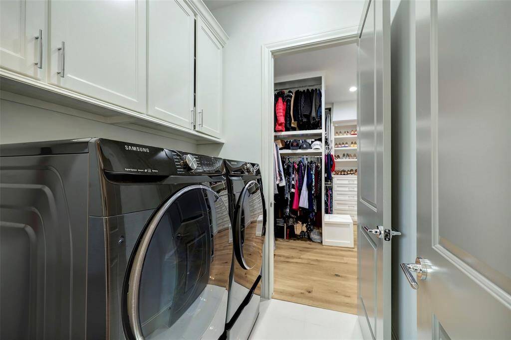 Laundry Room with built in cabinets.
