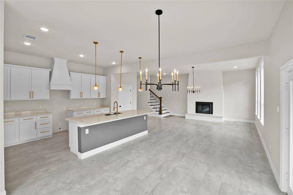 Spacious open-concept living, kitchen, and dining area, perfect for entertaining family and guest.