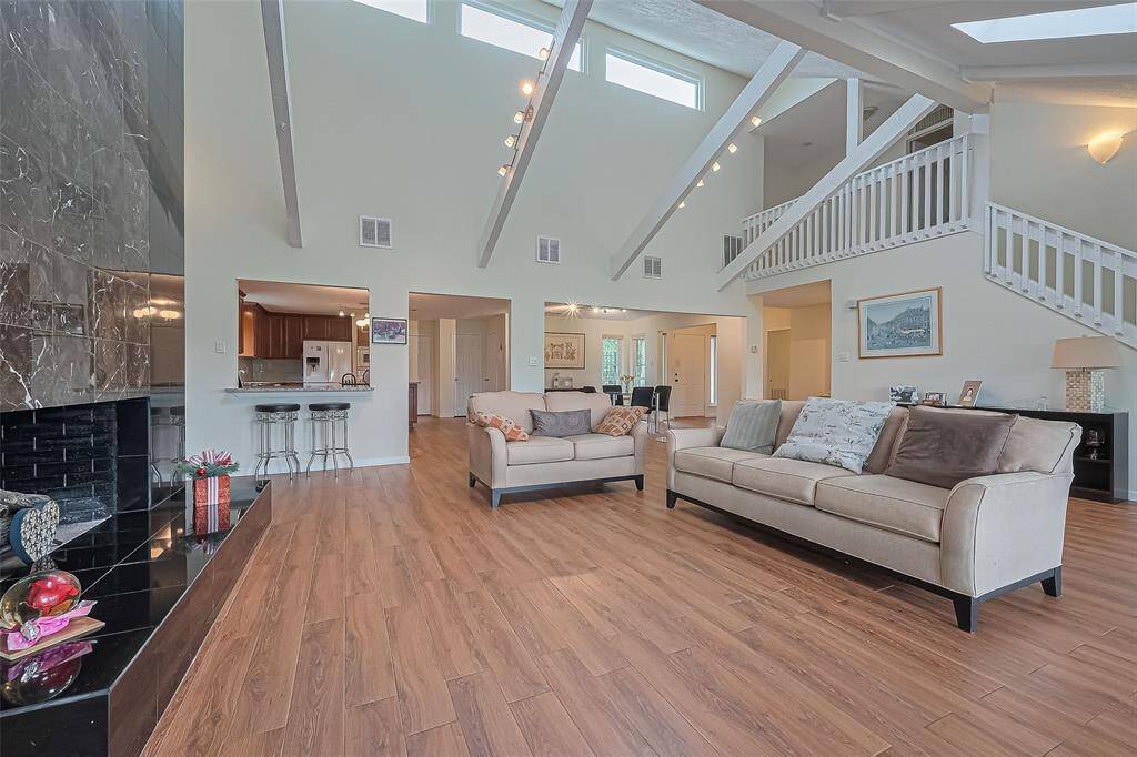 Large living area with high ceilings