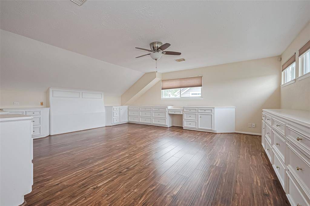 Large room upstairs with built ins