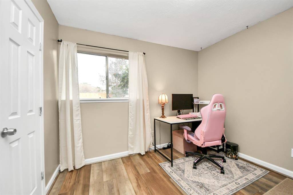 Second bedroom that is currently being utilized as a gaming room.