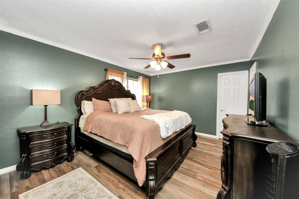 The Primary bedroom offers plenty of space for grand furniture.