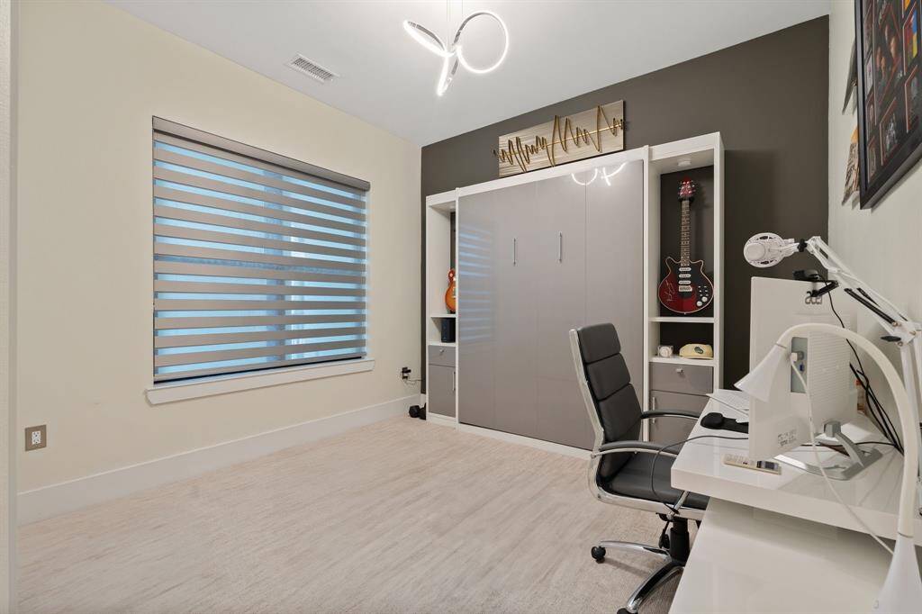 Built in queen size Murphy bed in up position.