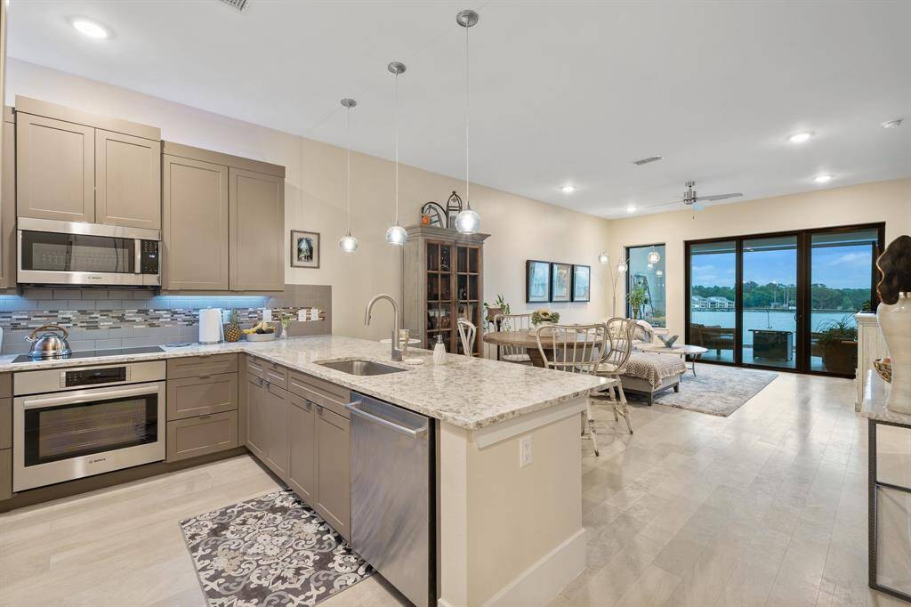 Kitcen to dining to living area.