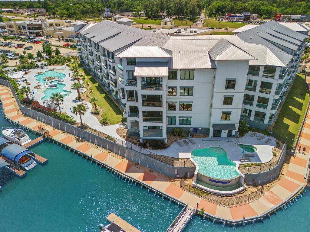 Center of building where hot tub and 2nd pool are.