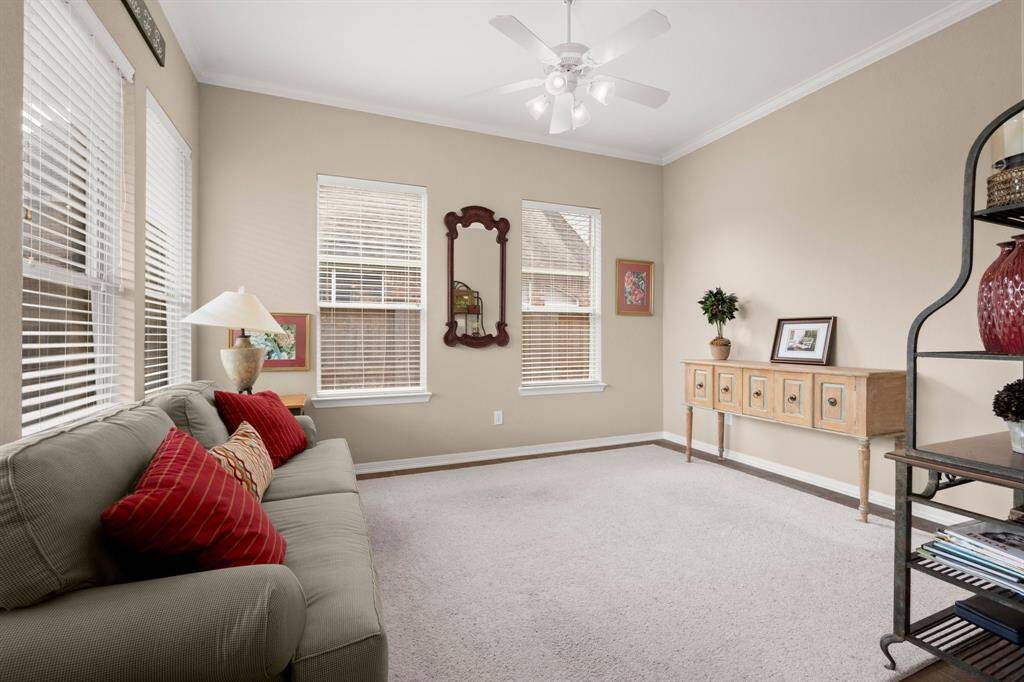 Sunroom/additional living area off of the kitchen. A great playroom, second office, gym....you decide!