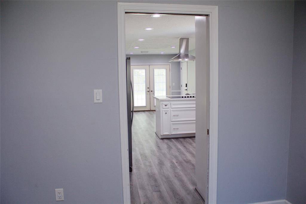 Discover the elegance of the newly updated kitchen, featuring modern design and ample natural light.