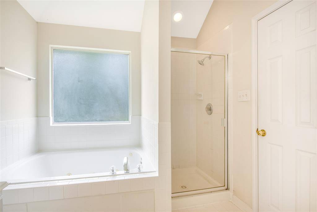 Primary Bathroom with Garden Tub and Separate Shower!